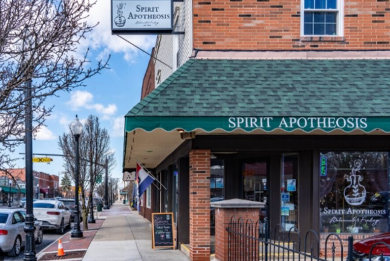 Historic downtown Bedford street scene with Spirit Apotheosis storefront